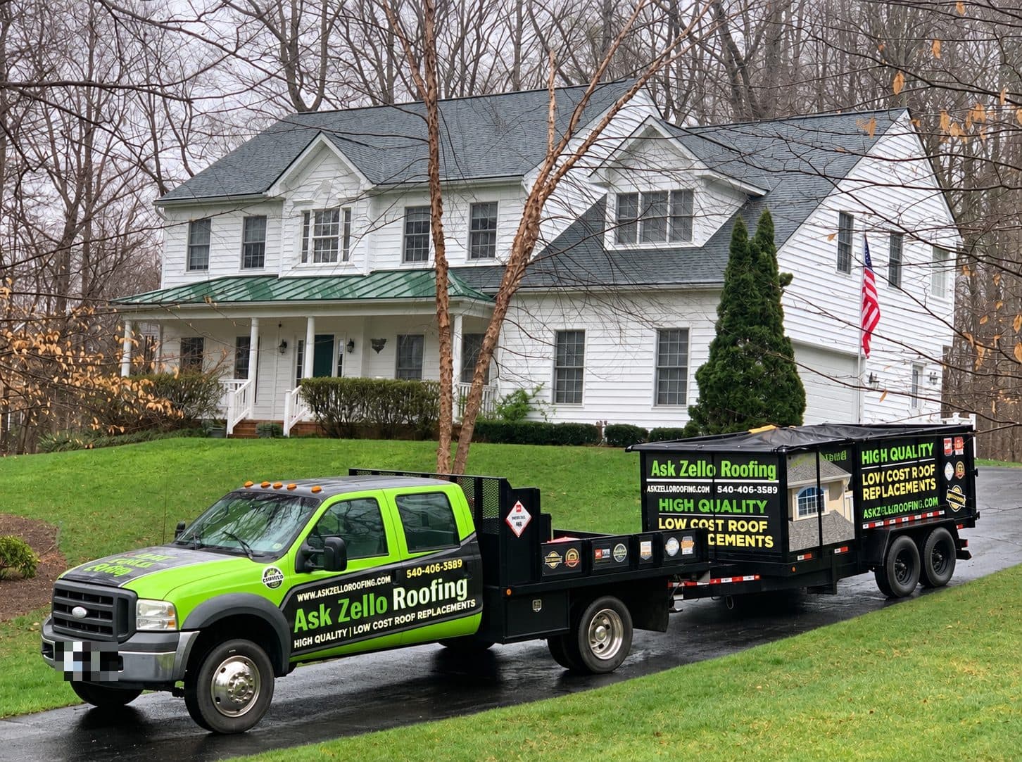 Ask Zello Roofing truck and dump trailer at a completed roof replacement project in Central Virginia.